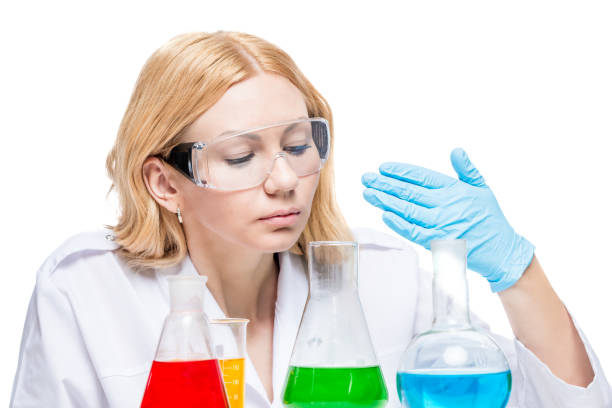 istock portrait of an experienced chemist with multi-colored substances in test tubes on a white background 859157338