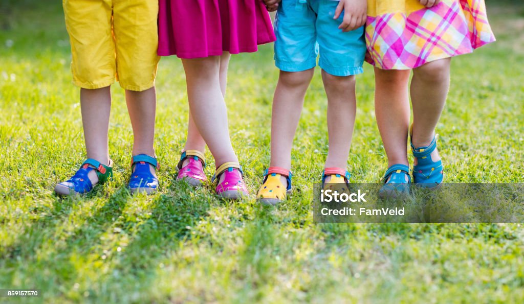 Kids With Colorful Shoes Children Footwear Stock Photo - Download Image Now  - Child, Sandal, Education - iStock
