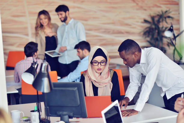 istock Multiracial contemporary business people working 859163708