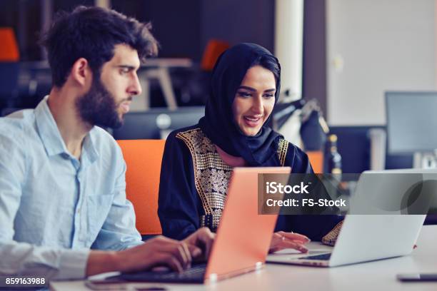 Multiracial Contemporary Business People Working Connected With Technological Devices Like Tablet And Laptop Stock Photo - Download Image Now