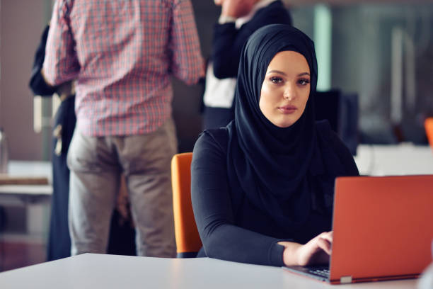 istock Multiracial contemporary business people working connected with technological devices like tablet and laptop 859164122