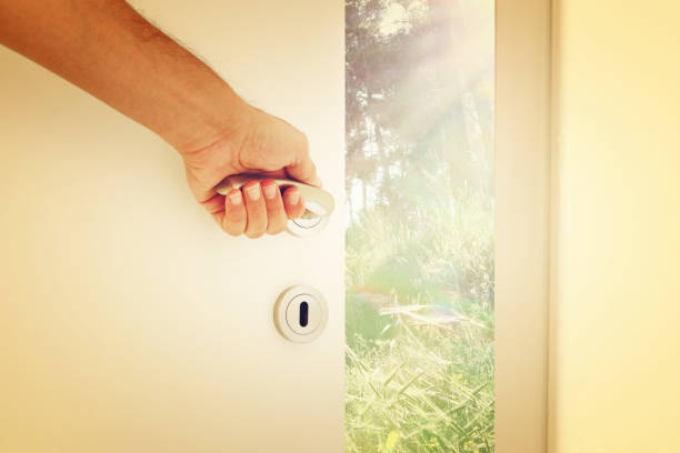 istock image of open door to the mysterious forest 859164584