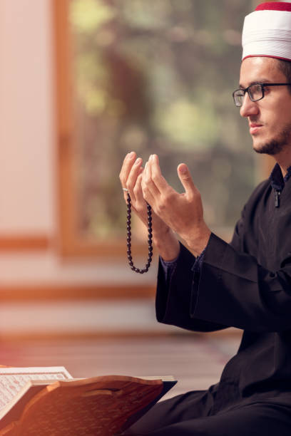 istock Religious muslim man praying inside the mosque 859171362