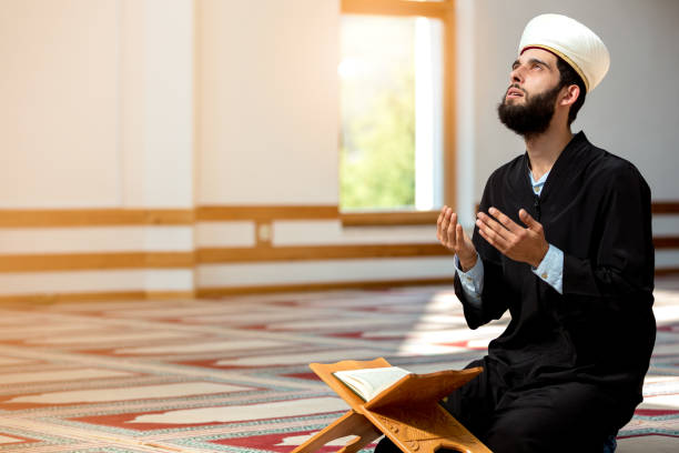 istock Religious muslim man praying inside the mosque 859176640