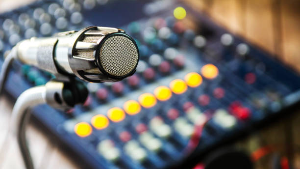 istock Microphones and mixers, video production equipment, multimedia creation. 859183196