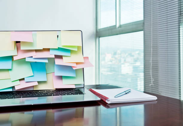 istock Laptop and note book on office desk 859185684