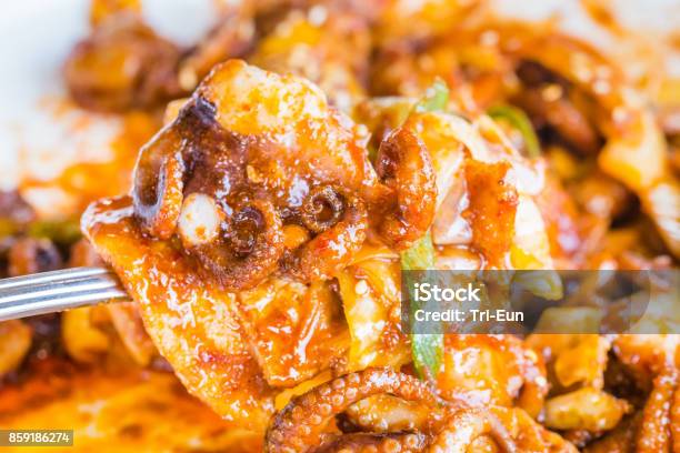 Stirfried Spicy Octopus Stock Photo - Download Image Now - 2010 Asian Games, Asian Games, Calamari