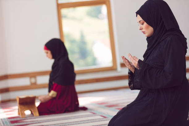 istock Two Muslim women praying 859186896