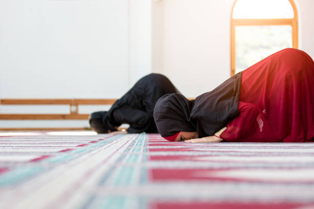 istock Two Muslim women praying 859189106