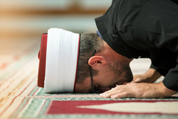 istock Young Imam praying inside of beautiful mosque 859192750