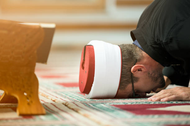 istock Young Imam praying inside of beautiful mosque 859192930