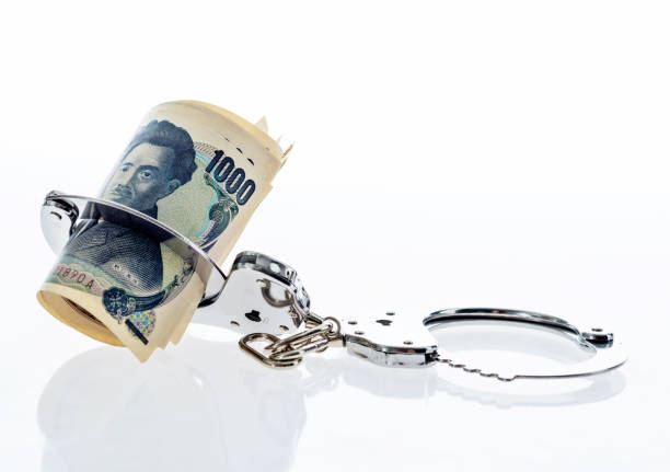 istock Japanese yen notes in handcuffs 859195500