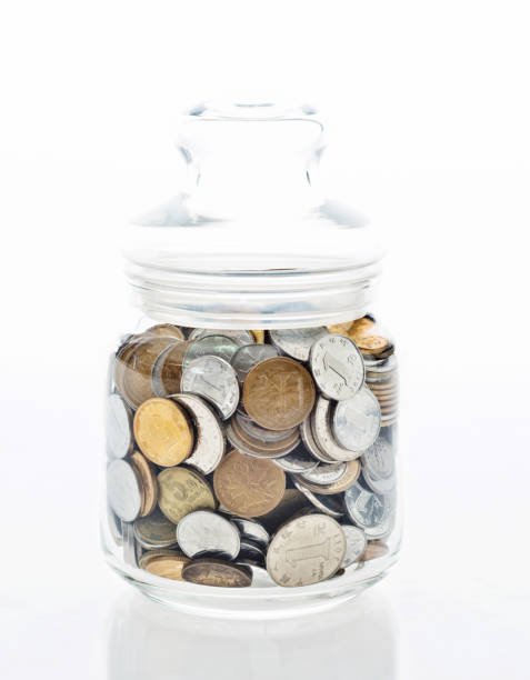 istock Group of coins in the jar 859195516