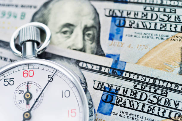 istock Stopwatch on the US dollars 859195852