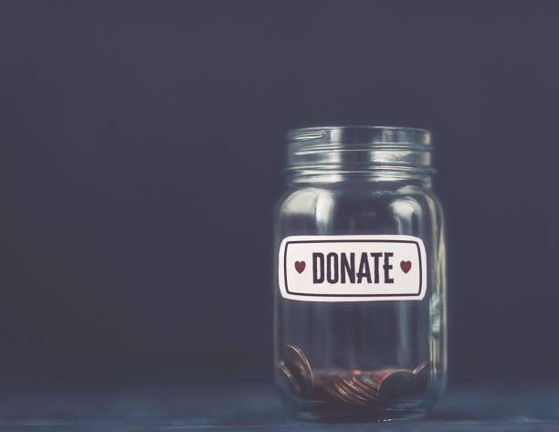 istock Empty money jar filled with donation reminder 859195960