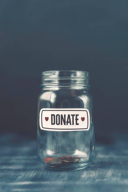 istock Empty money jar filled with donation reminder 859195962