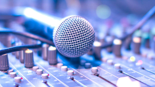 istock Microphone on the audio mixer in the audio control room. 859205032