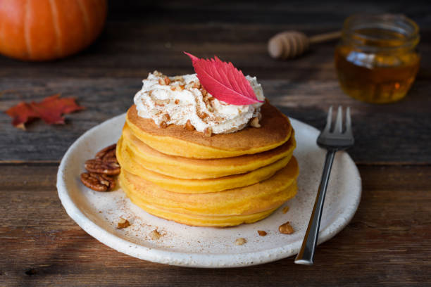 istock Pumpin pancakes with whipped cream and nuts 859219652