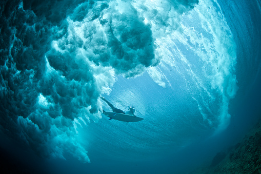 Under the water perspective of a duck dive