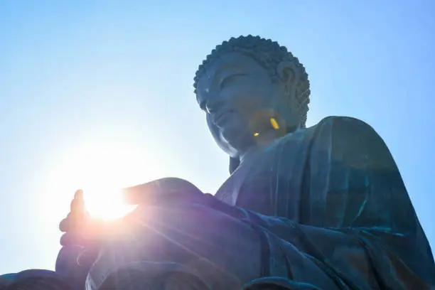 Ngong Ping buddha statue has a light on his hand, look like he use his power to guiding people and eliminate bad thing.