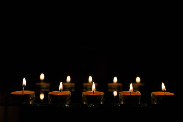 istock Many burning candles with shallow depth of field 859226846