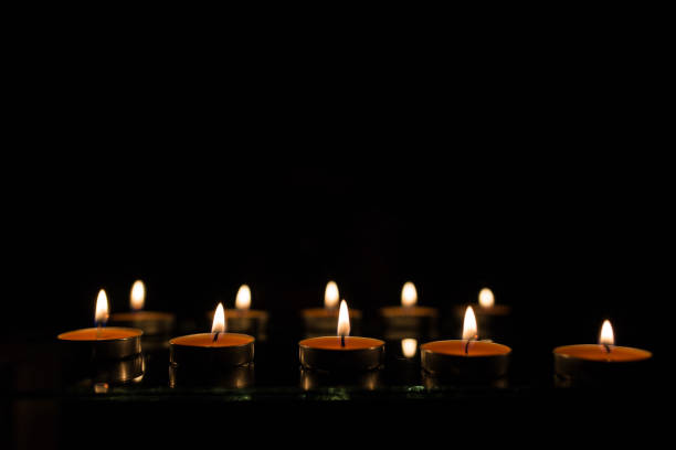 istock Many burning candles with shallow depth of field 859226852