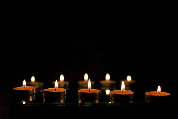istock Many burning candles with shallow depth of field 859226864