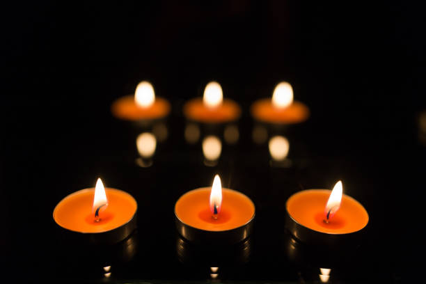 istock Many burning candles with shallow depth of field 859226996