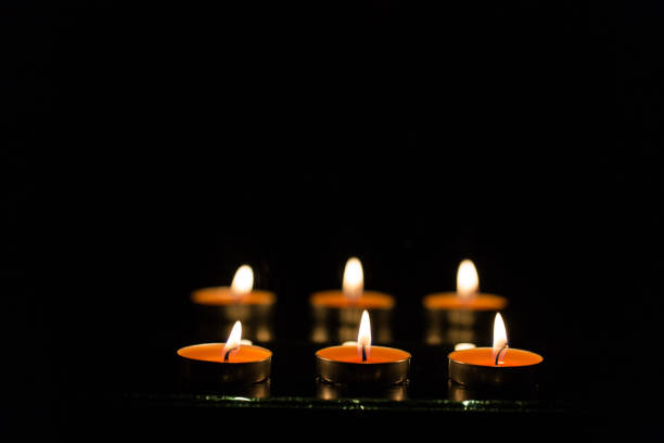 istock Many burning candles with shallow depth of field 859227086