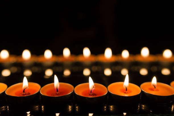istock Many burning candles with shallow depth of field 859229338