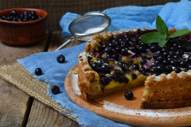 istock Homemade blueberries pie with custard on shortbread dough. Berries cake. 859229598