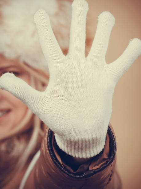 istock Woman in winter hat and gloves 859230138