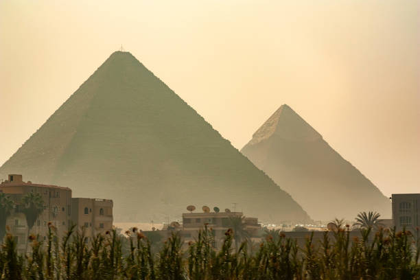 istock The Great Pyramids towering beyond Giza city 859250590