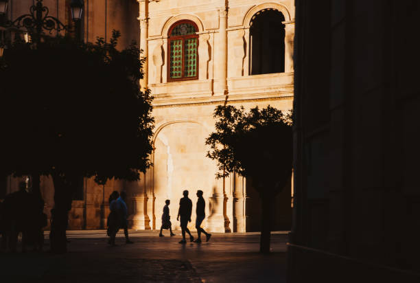 Seville, Spain; September 13th 2017; People walking past the cathedral in Seville,Spain. Seville cathedral is the third largest cathedral in the world.