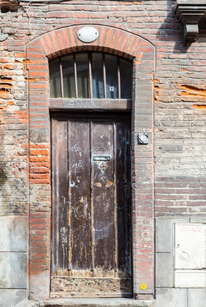 istock Old rustic door in old French house 859265854