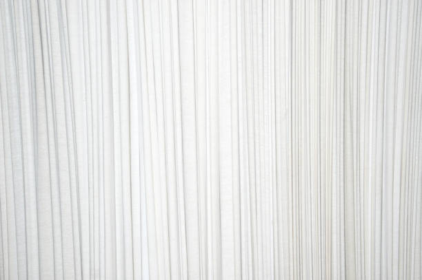 White pleated fabric in the crease pattern.