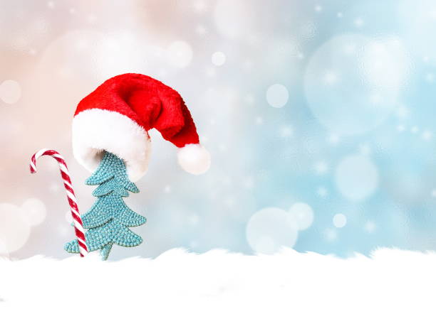 istock Christmas tree in Santa hat and Christmas decoration background 859280758
