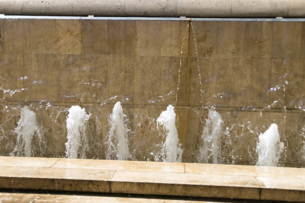 istock Front view of fountains water jets 859281014