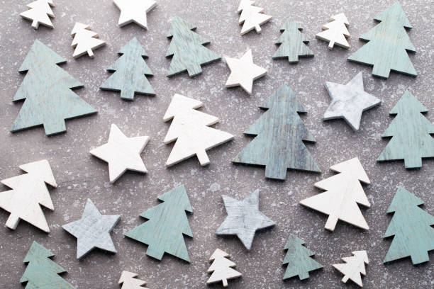 istock Christmas wooden decor on the snow background. 859284380