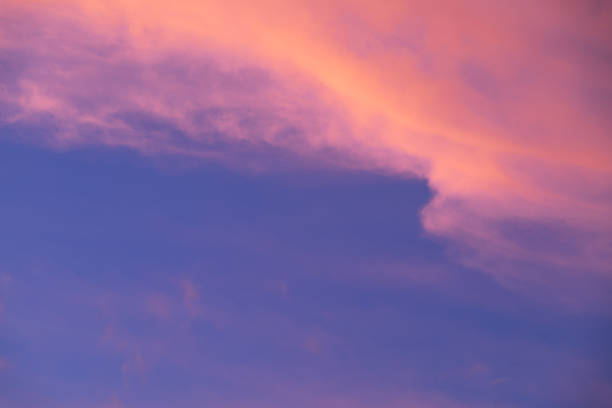 istock Pink Sky Background, a sunset sky with delicate pink clouds 859285050