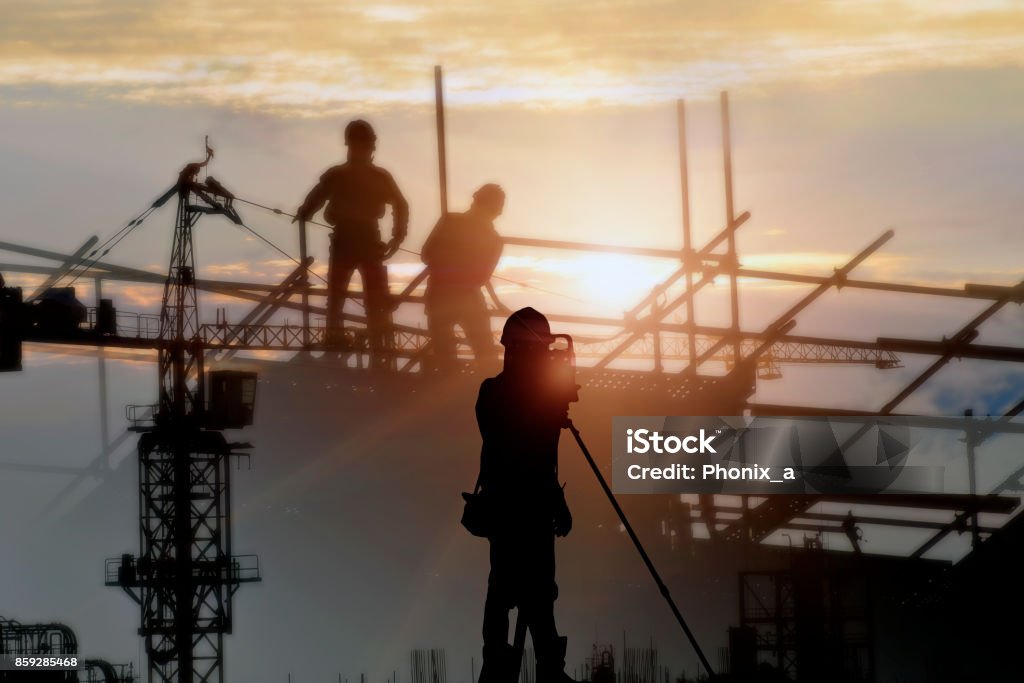 Silhouette construction site  and sunset background. silhouette construction site . Rebuilding Stock Photo