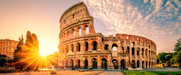 istock sunrise behind Colosseum in Rome Italy 859288742