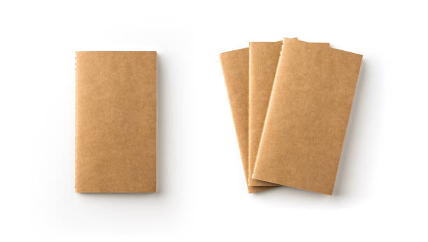Top view collection of spiral kraft notebook on white background