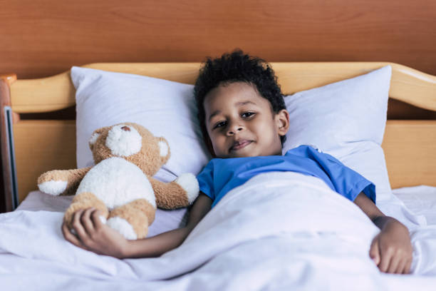 istock african american boy with teddy bear 859292028