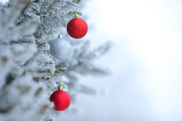 istock Christmas ornaments background with snow 859293390