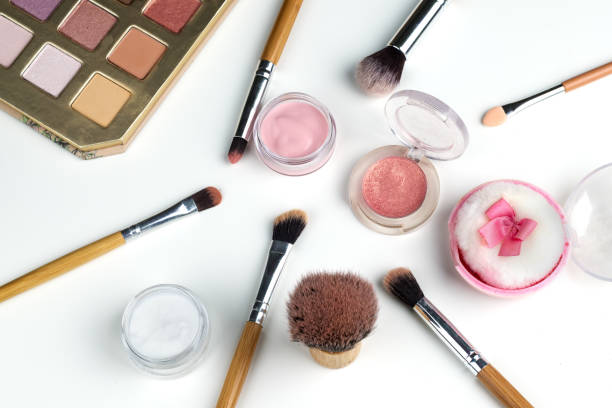 istock beauty concept : cosmetics top view on a white table. Workplace, cosmetic bag 859293524