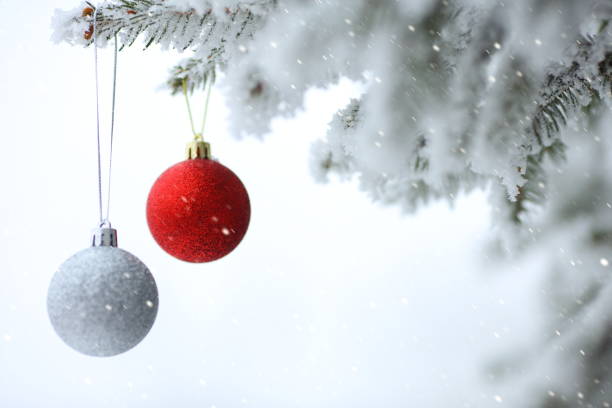 istock Christmas ornaments background with snow 859293684