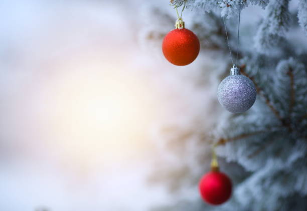 istock Christmas ornaments background with snow 859293962