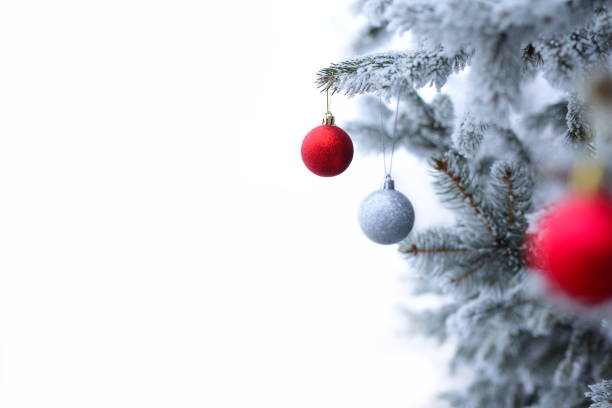 istock Christmas ornaments background with snow 859296364
