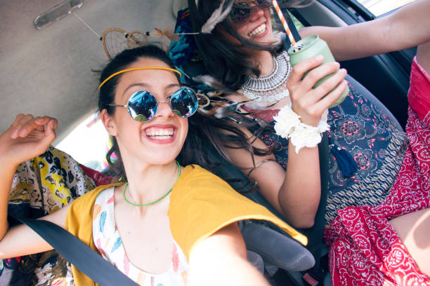 istock Friends traveling in car 859296740